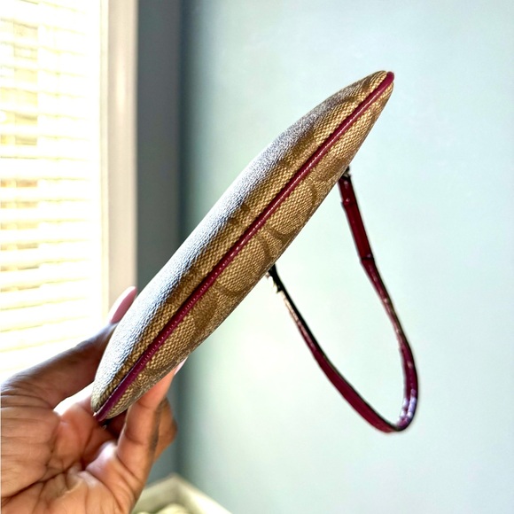 Coach Brown Signature Canvas Wristlet with Plum Trim - Picture 5 of 10